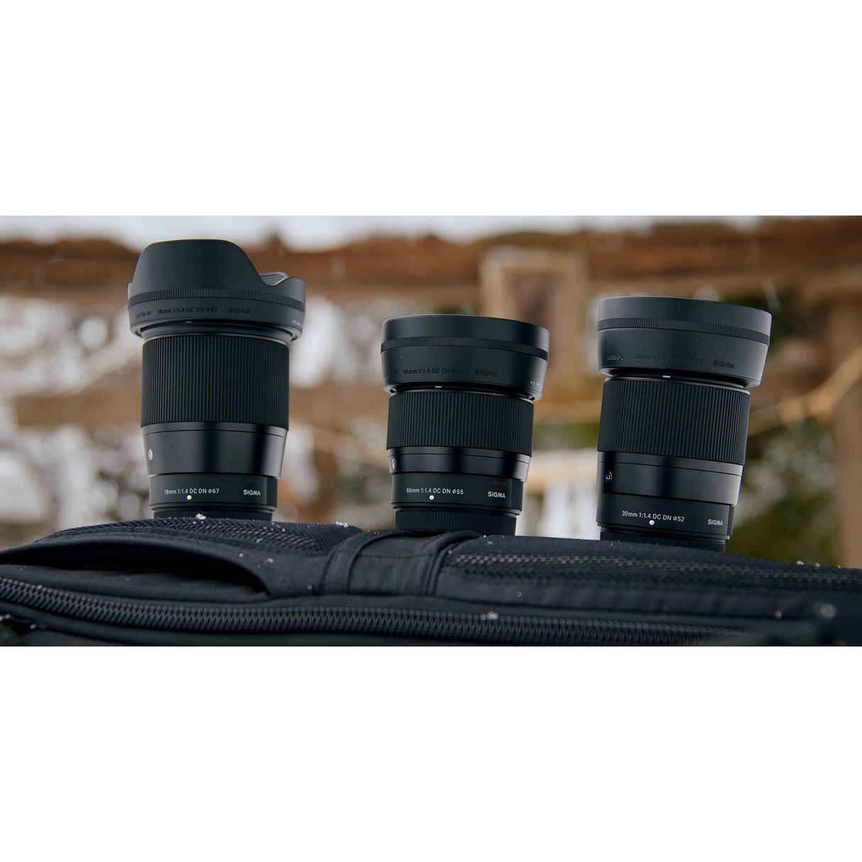 Sigma 16mm F1.4 Contemporary DC DN Lens for Fuji X Mount with Battery and Dual Charger Bundle