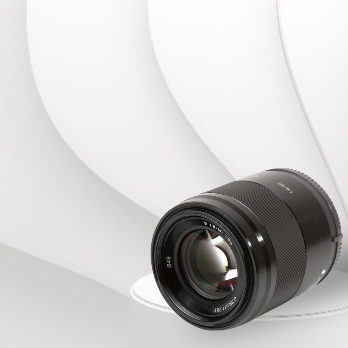 Sony E 50mm f/1.8 OSS Prime Lens (Black) with Editing Software, 64GB Memory Card, and Accessories