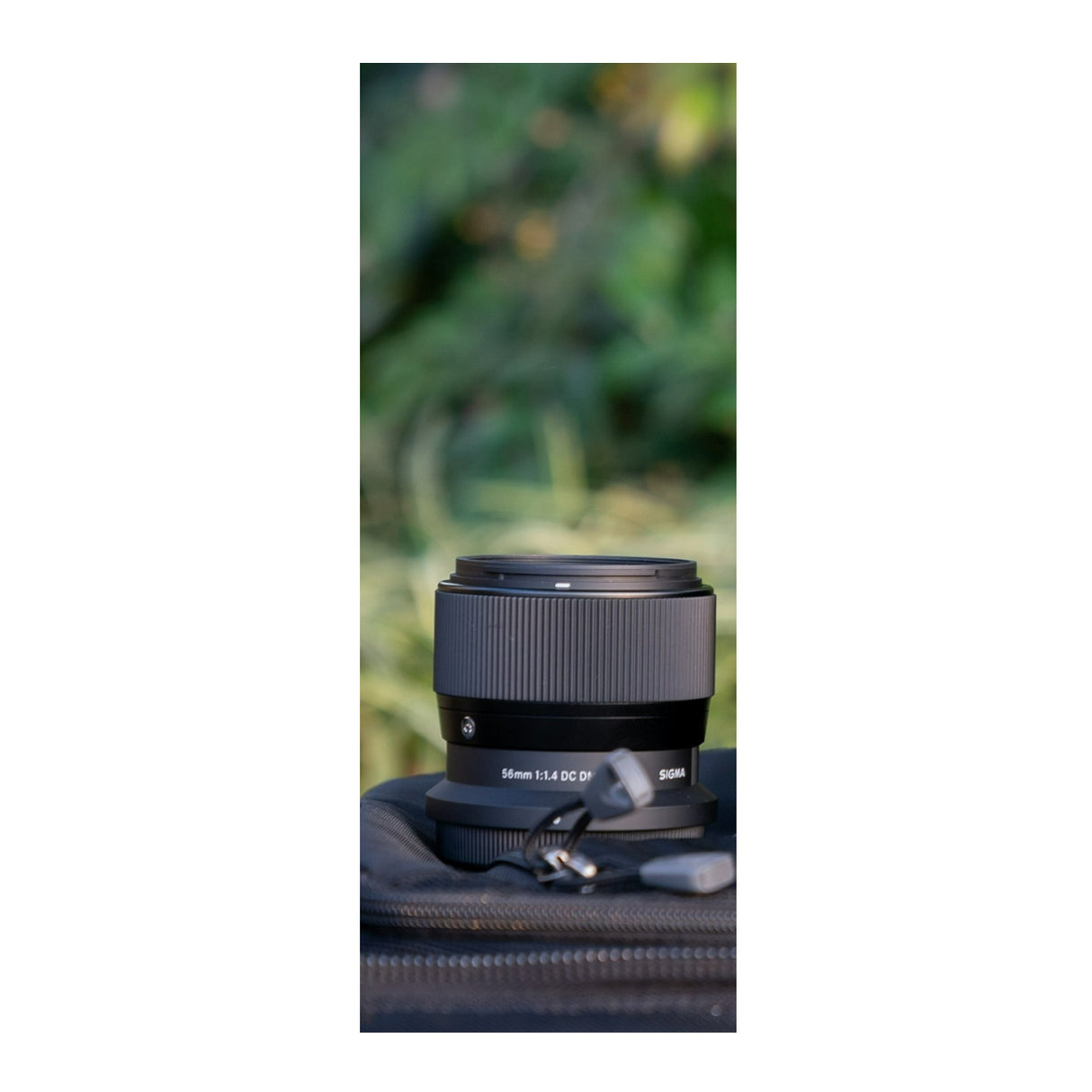 Sigma 56mm F1.4 DC DN Contemporary Lens for Nikon Z Mount with Lens Hood (Black) w/Storage Bundle