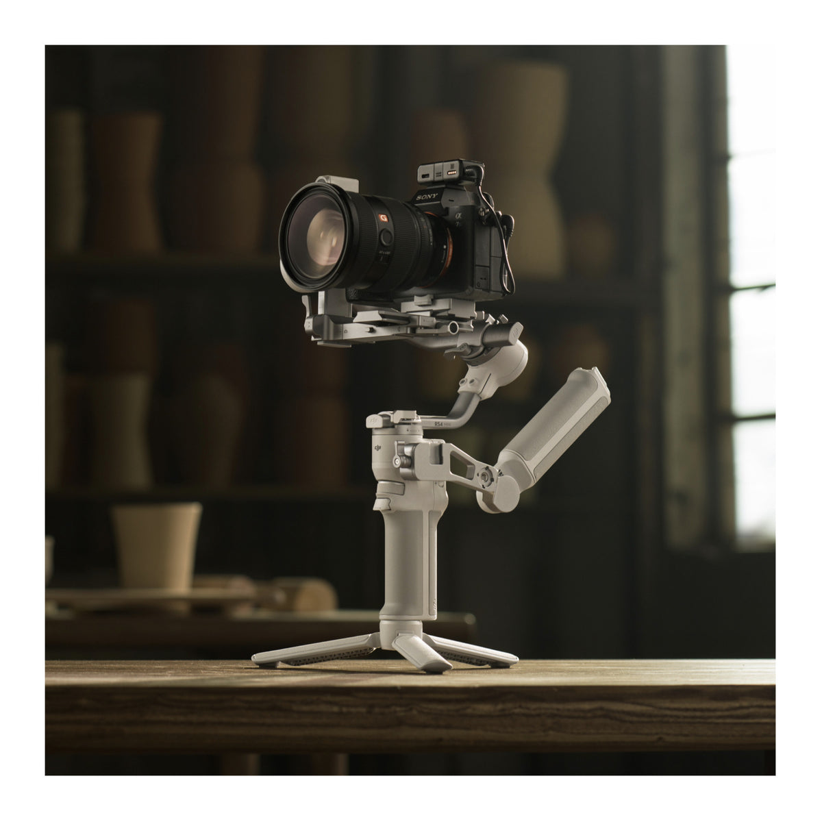 DJI RS 4 Mini Combo Gimbal Stabilizer for Cameras with Auto Axis Locks with Carrying Case
