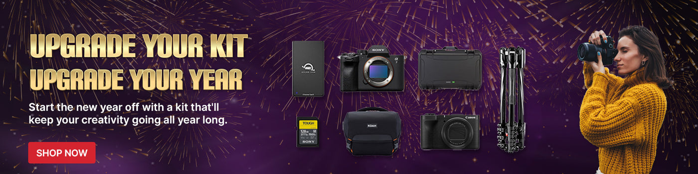 Promotional banner for camera equipment with text and images of cameras and accessories on a purple background.